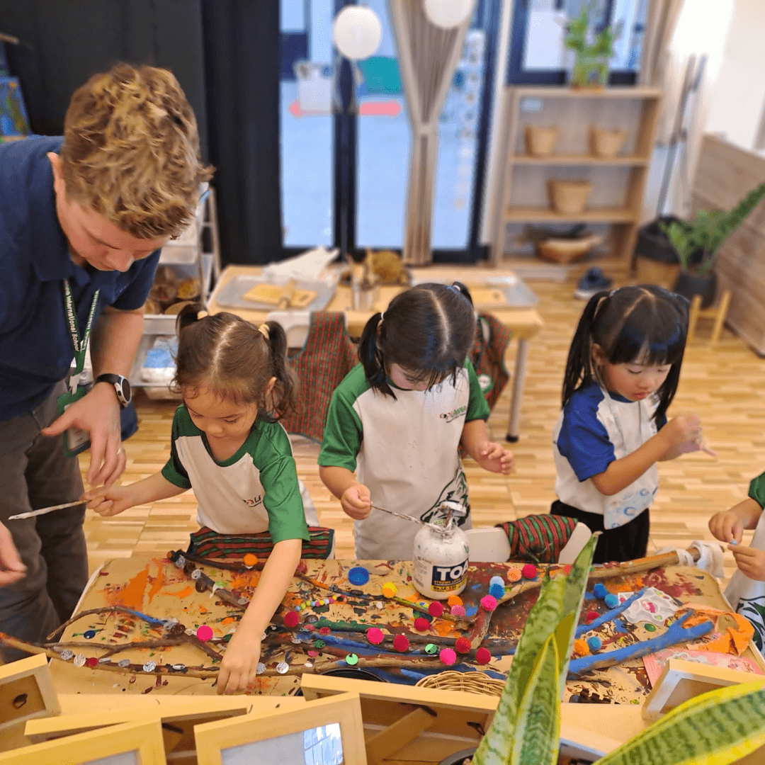 Group girls play color art in the class room