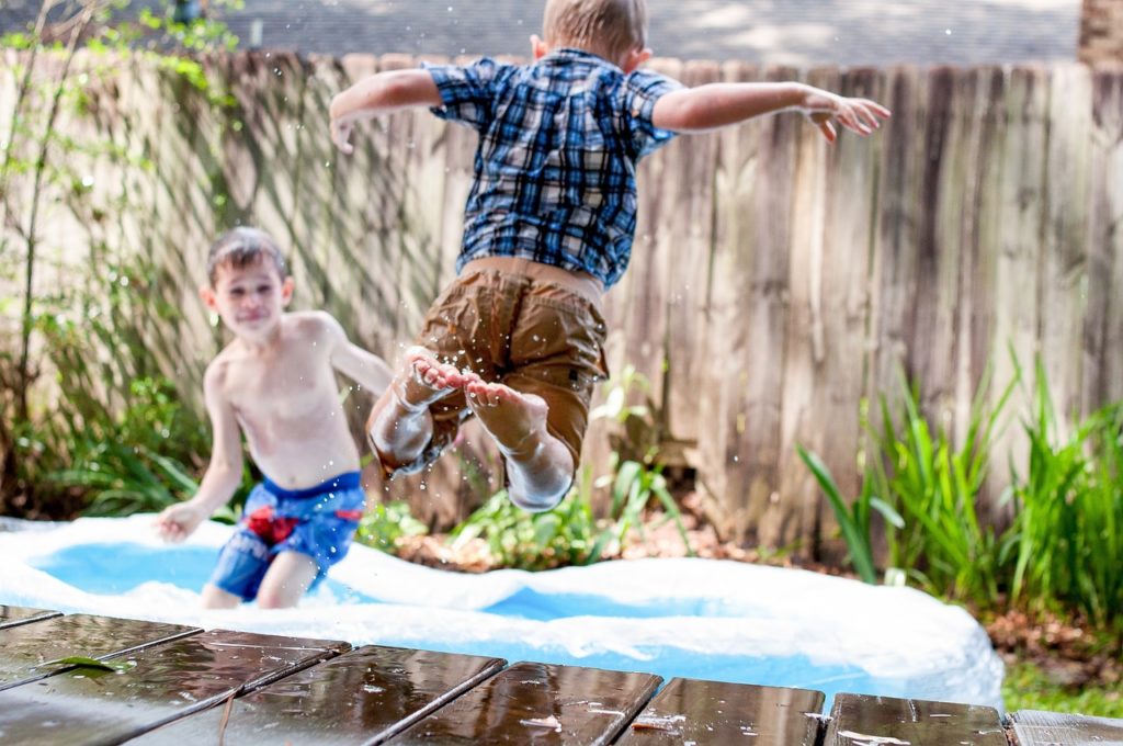 Boys doing water play