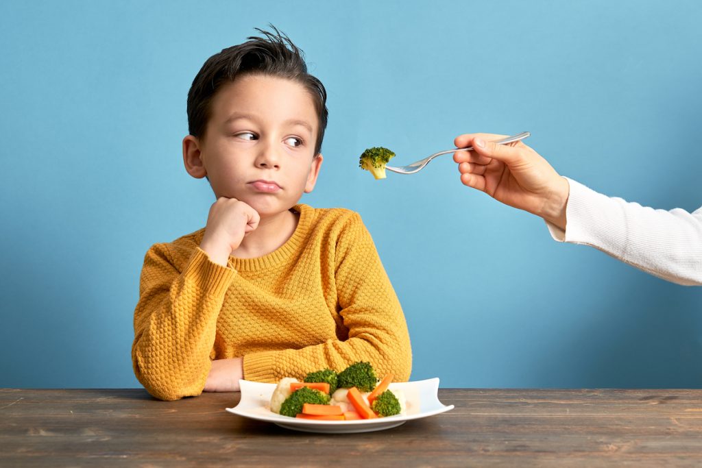 Child is very unhappy with having to eat vegetables.