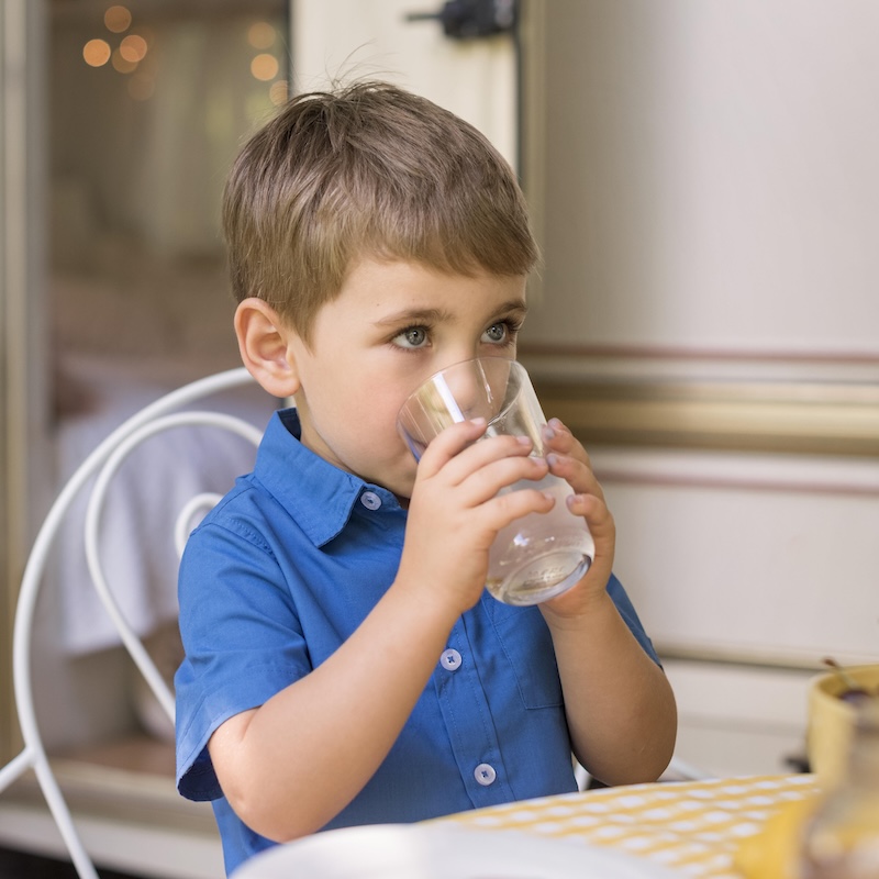 Boy drinking lemonade