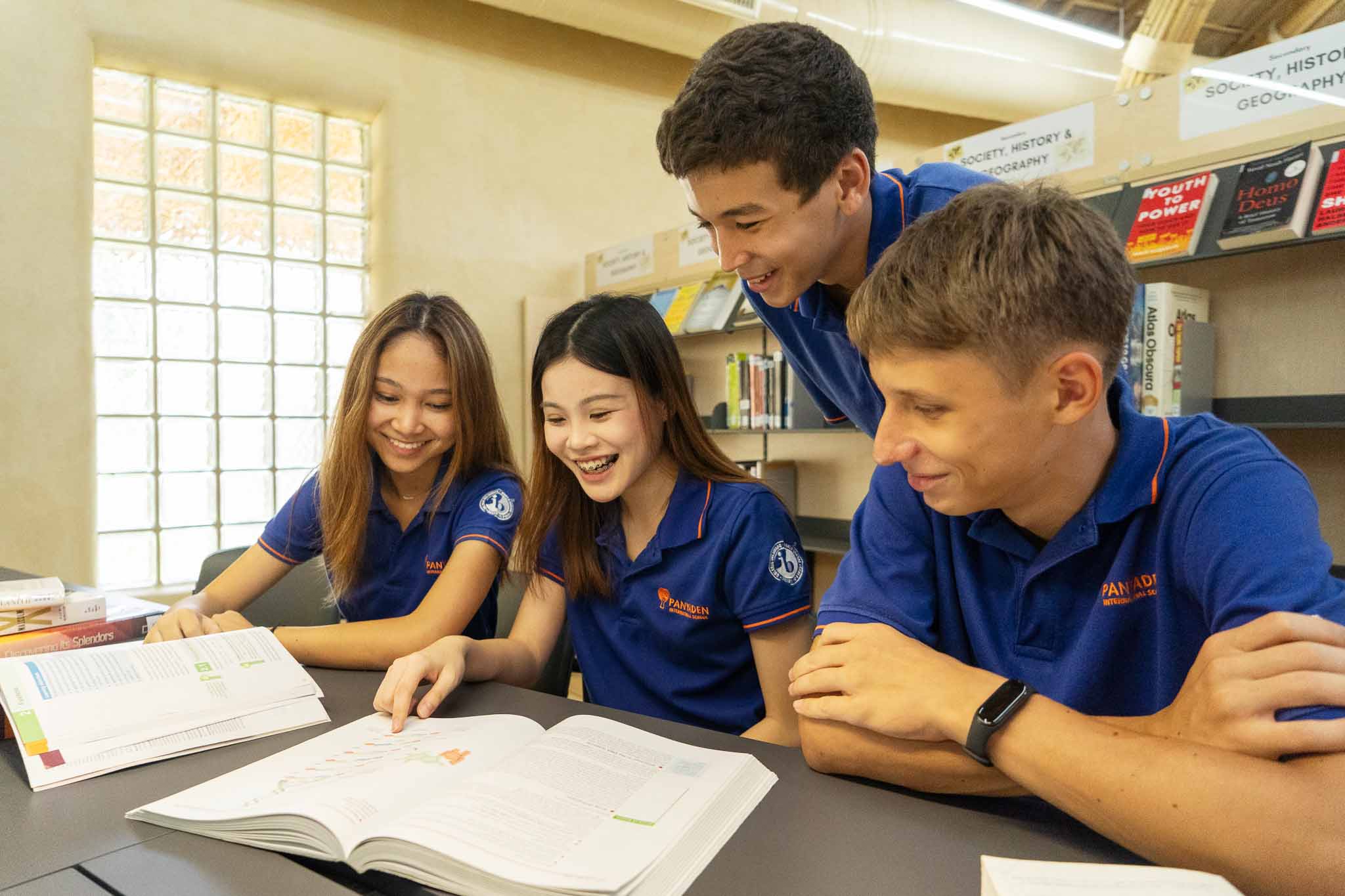 Group of Senior students sitting at a table at Panyaden