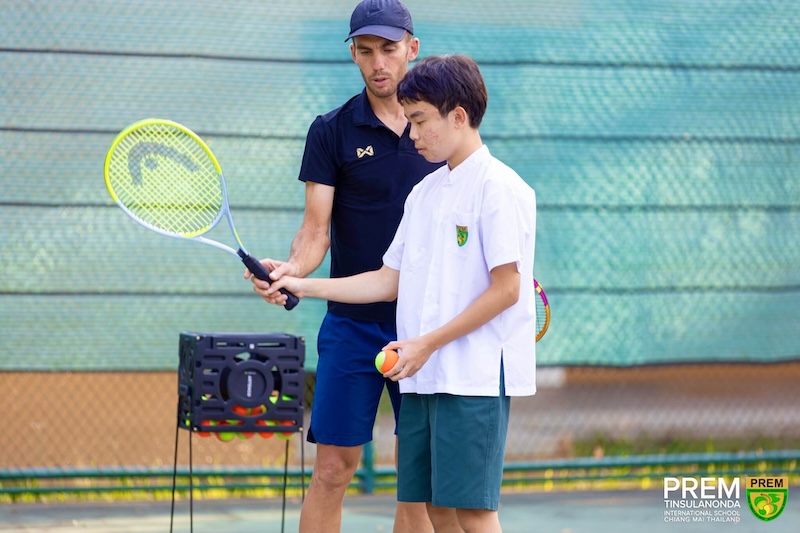Prem Int'l school - student playing tennis