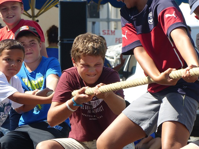 Boys playing tug of war